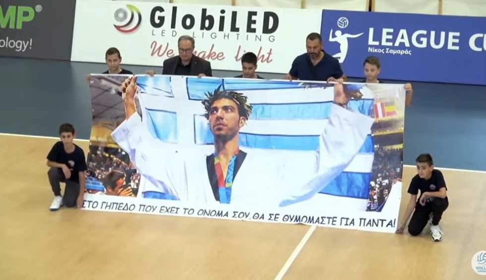 A generic square placeholder image with rounded corners in a figure.