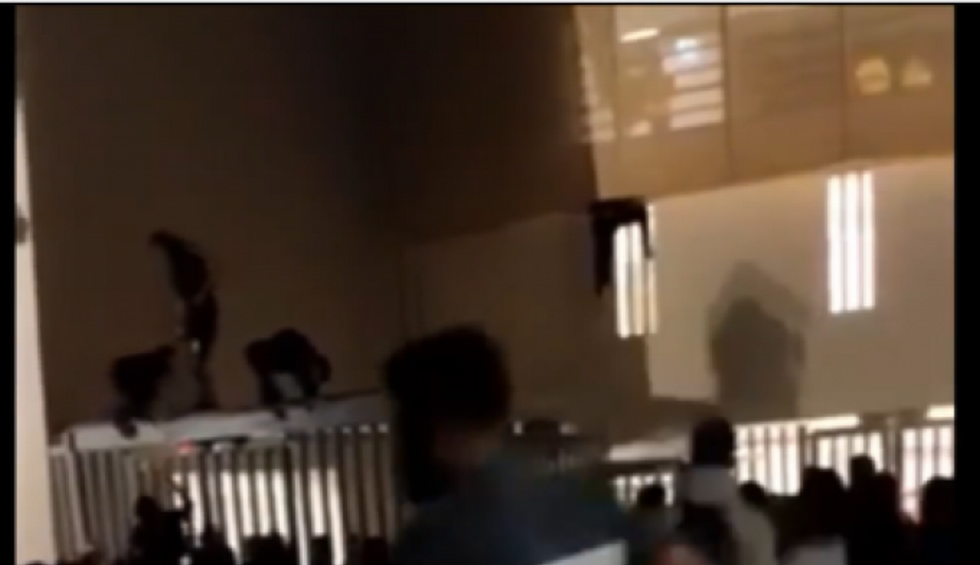 A generic square placeholder image with rounded corners in a figure.