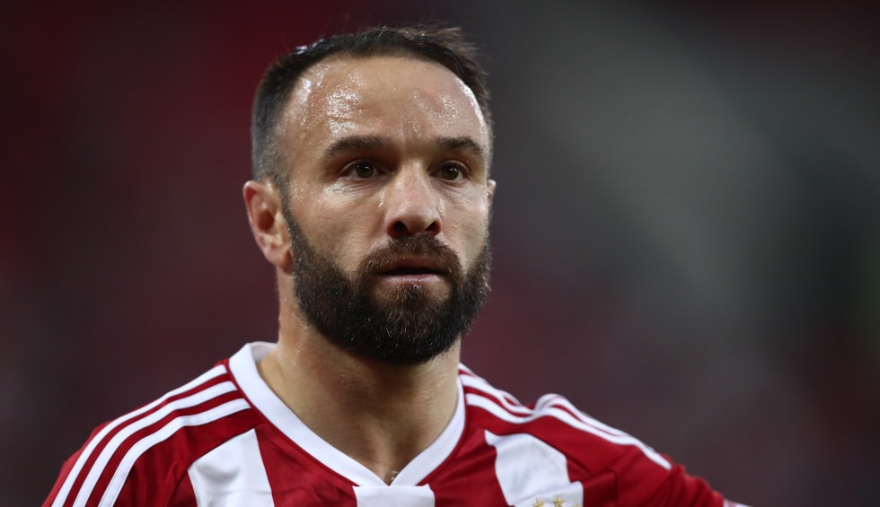 A generic square placeholder image with rounded corners in a figure.