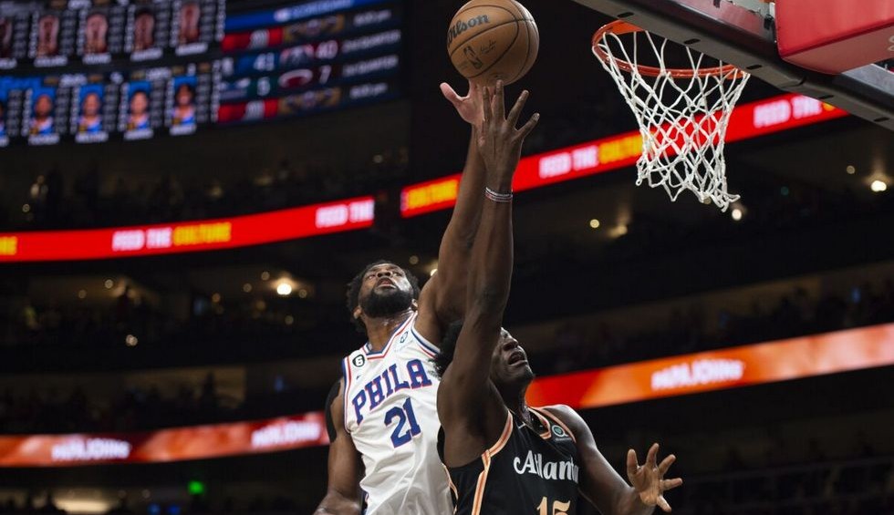 A generic square placeholder image with rounded corners in a figure.