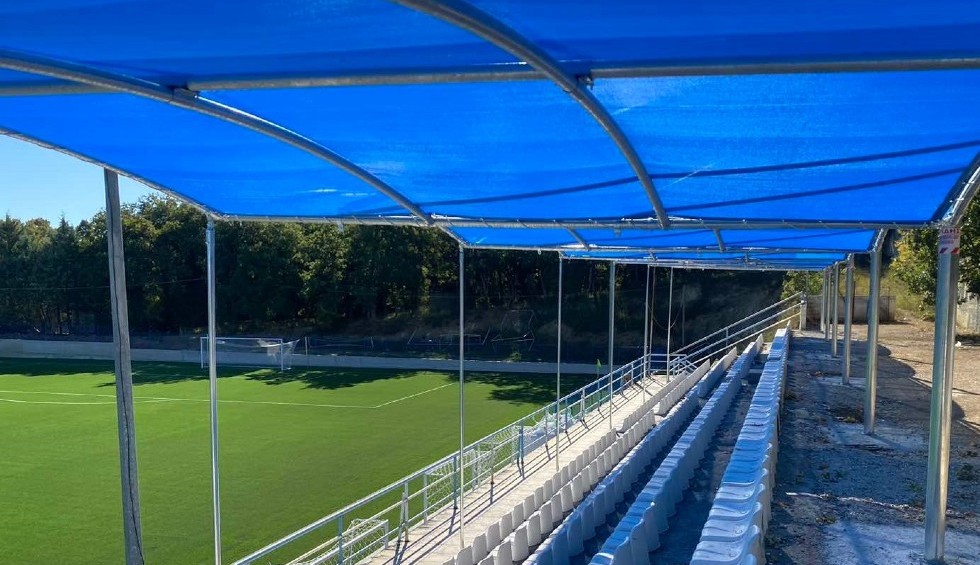 A generic square placeholder image with rounded corners in a figure.