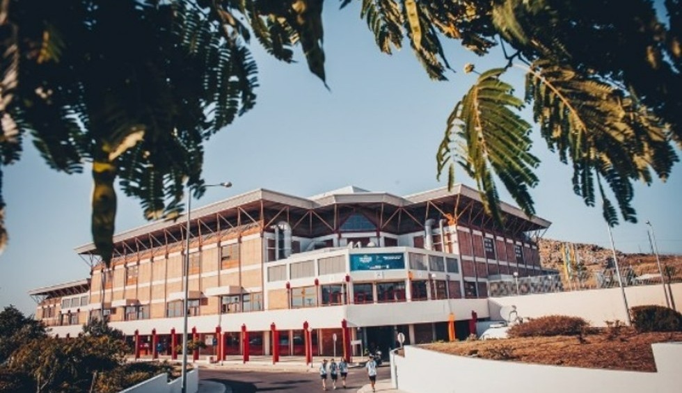 A generic square placeholder image with rounded corners in a figure.