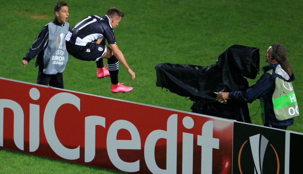 A generic square placeholder image with rounded corners in a figure.