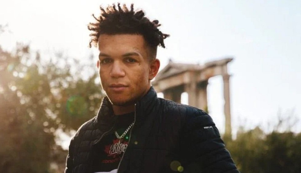 A generic square placeholder image with rounded corners in a figure.