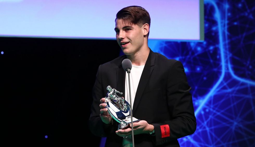 A generic square placeholder image with rounded corners in a figure.