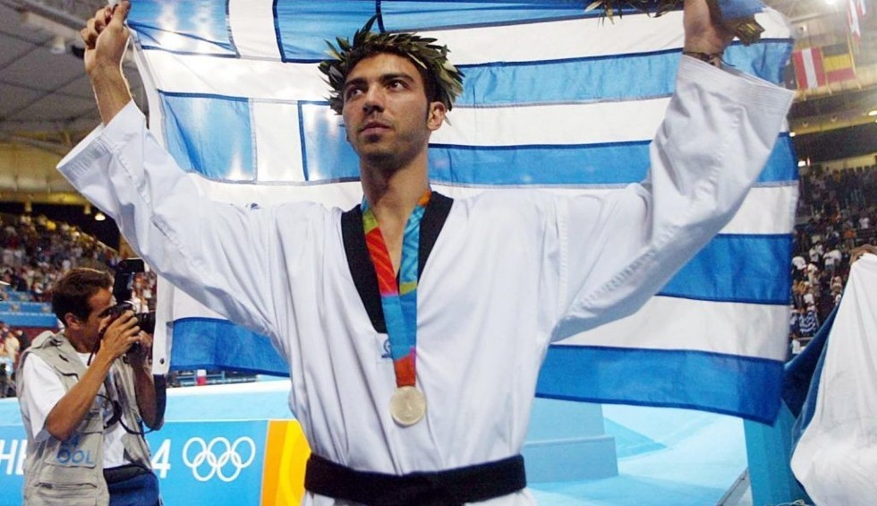 A generic square placeholder image with rounded corners in a figure.