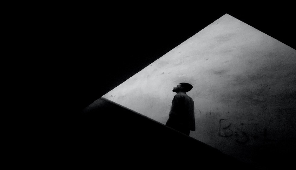 A generic square placeholder image with rounded corners in a figure.