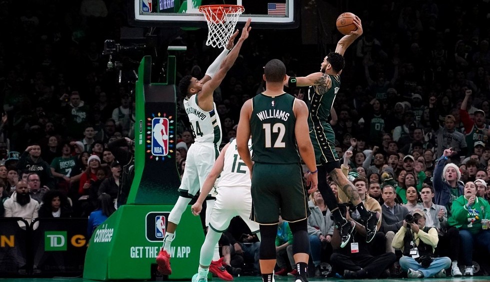 A generic square placeholder image with rounded corners in a figure.