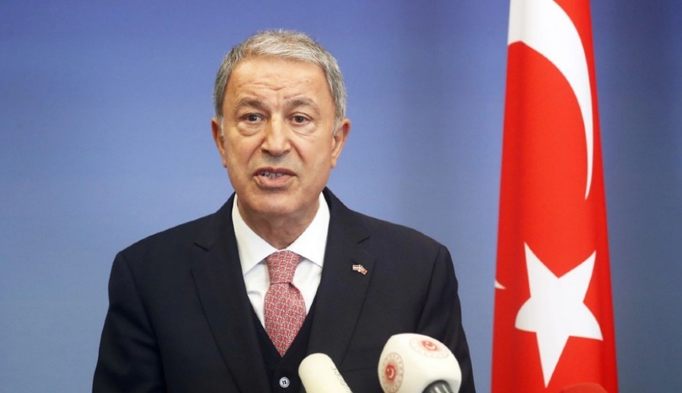 A generic square placeholder image with rounded corners in a figure.