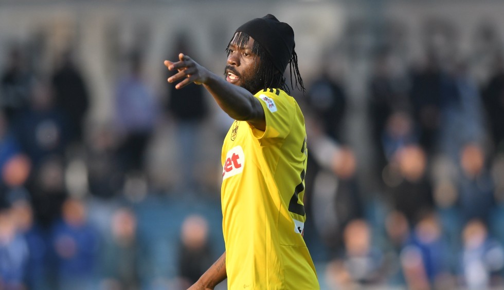 A generic square placeholder image with rounded corners in a figure.