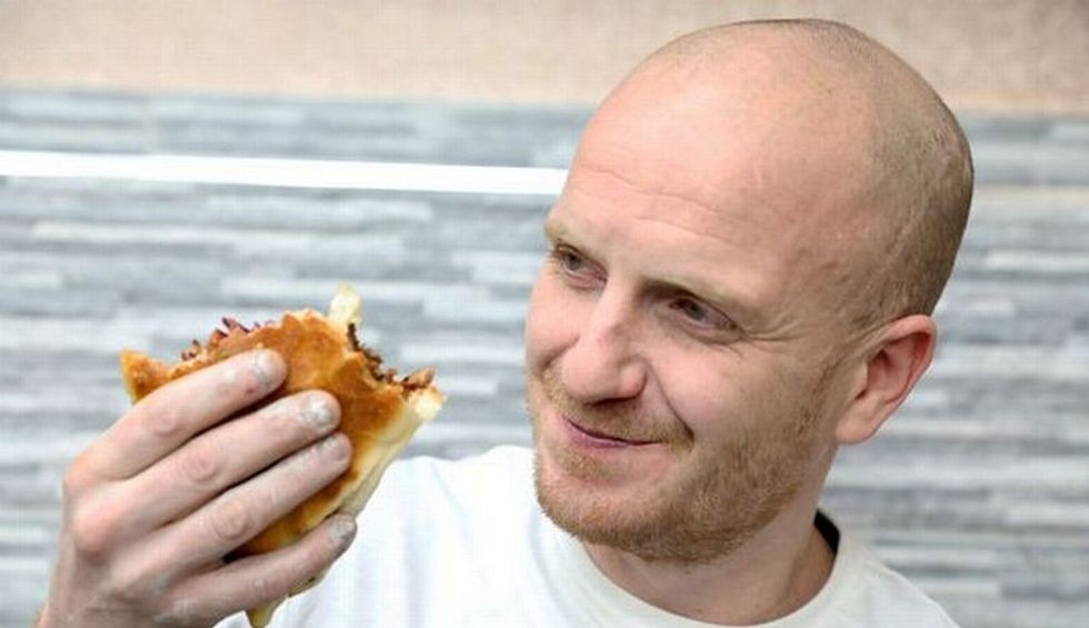 A generic square placeholder image with rounded corners in a figure.