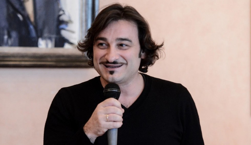 A generic square placeholder image with rounded corners in a figure.