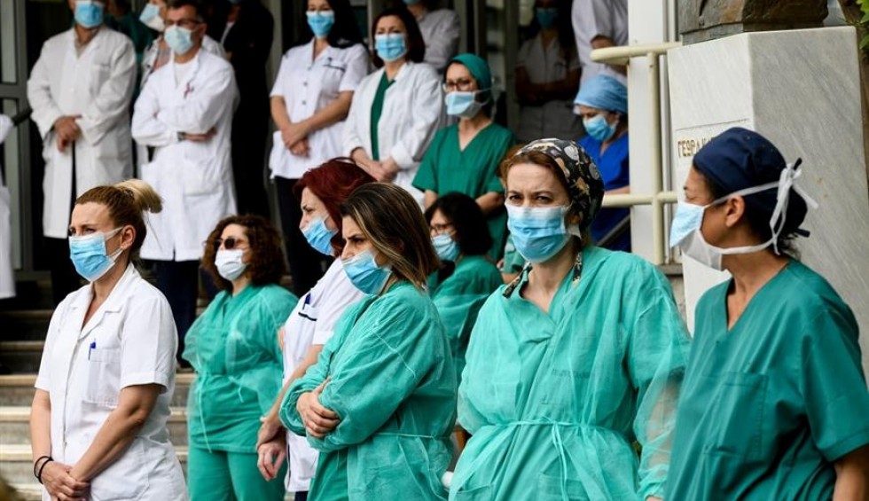 A generic square placeholder image with rounded corners in a figure.