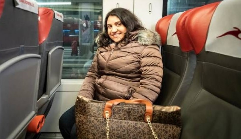 A generic square placeholder image with rounded corners in a figure.