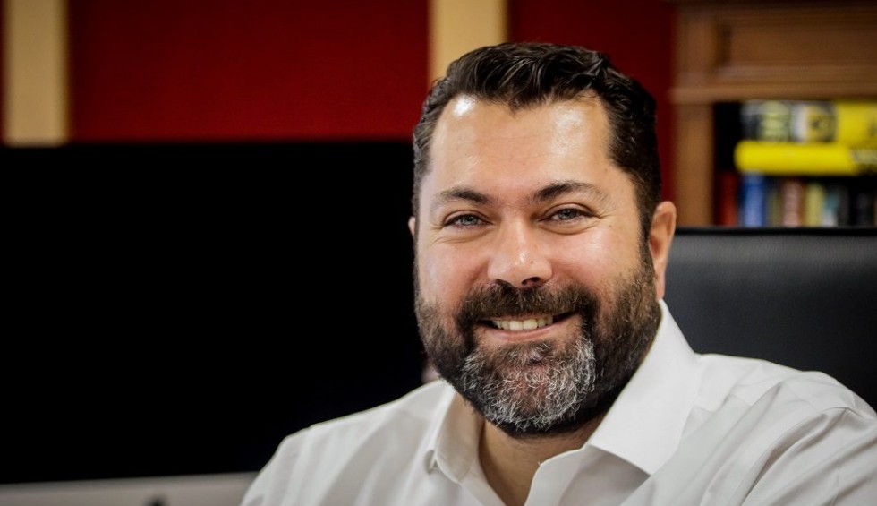 A generic square placeholder image with rounded corners in a figure.