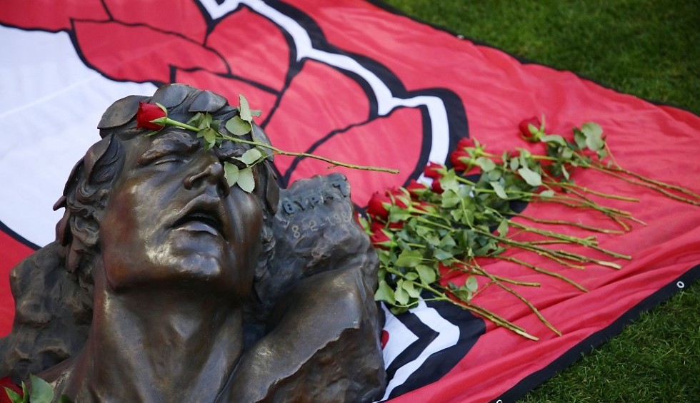 A generic square placeholder image with rounded corners in a figure.