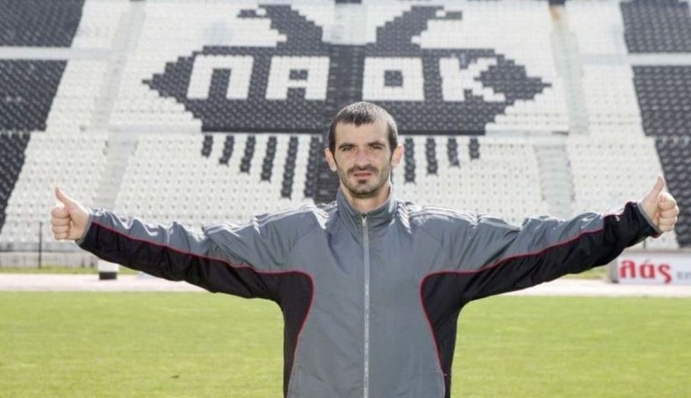 A generic square placeholder image with rounded corners in a figure.