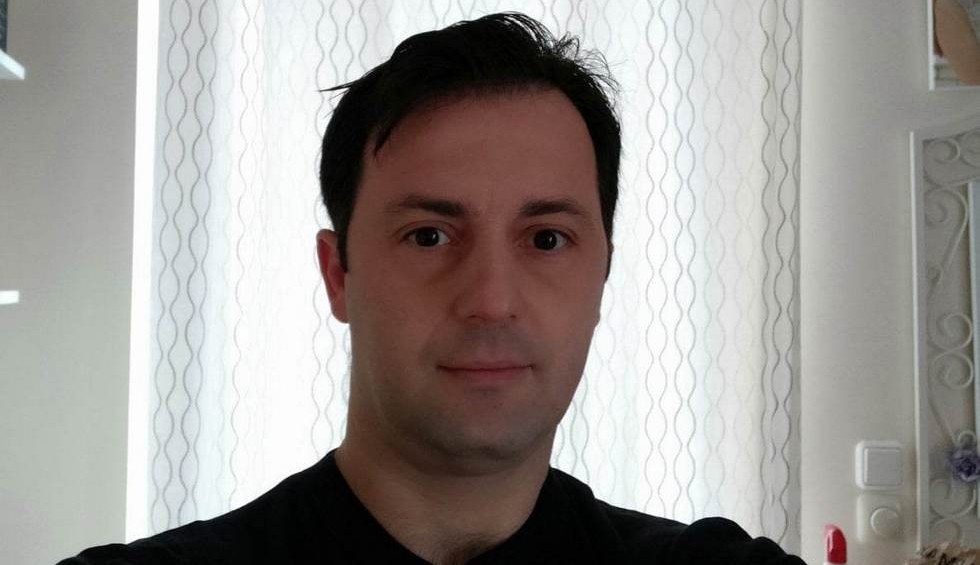 A generic square placeholder image with rounded corners in a figure.