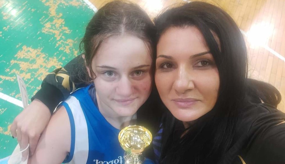 A generic square placeholder image with rounded corners in a figure.