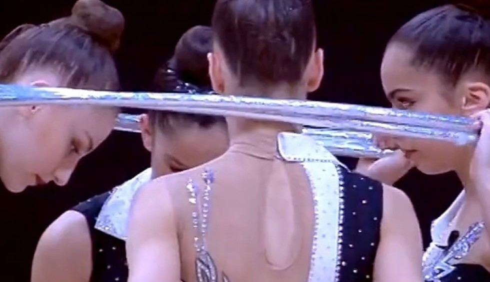 A generic square placeholder image with rounded corners in a figure.