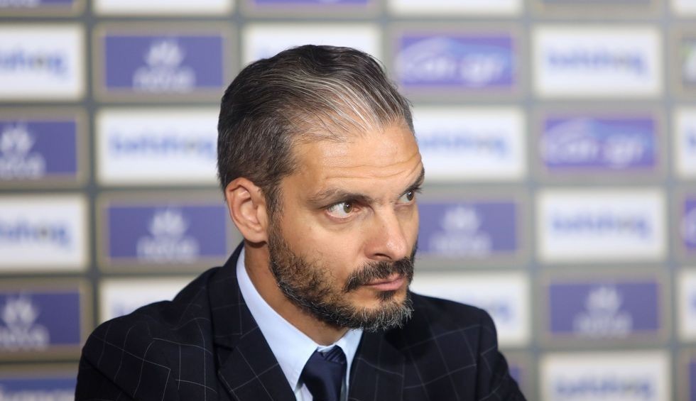 A generic square placeholder image with rounded corners in a figure.