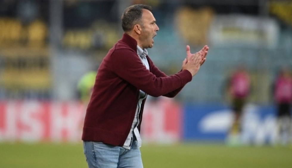 A generic square placeholder image with rounded corners in a figure.