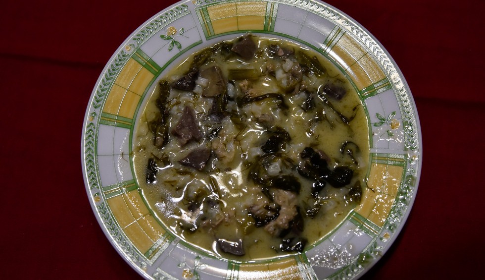 A generic square placeholder image with rounded corners in a figure.