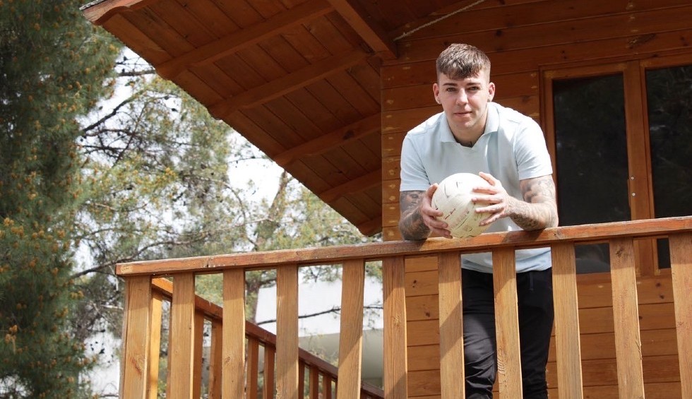 A generic square placeholder image with rounded corners in a figure.