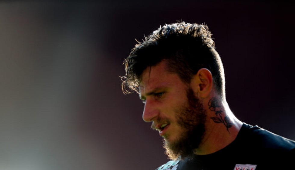 A generic square placeholder image with rounded corners in a figure.