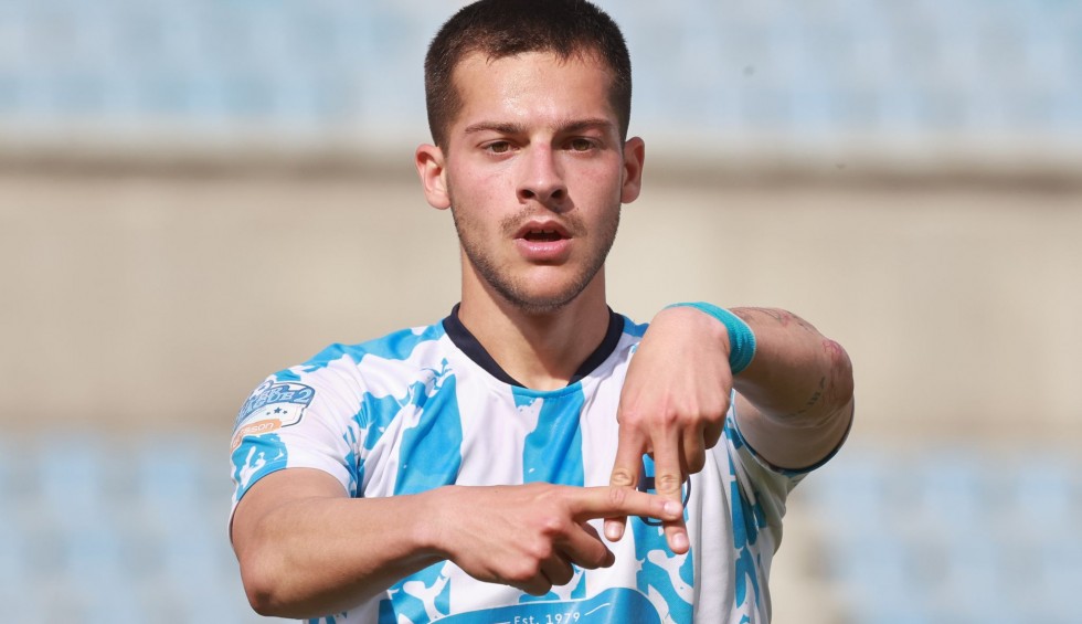 A generic square placeholder image with rounded corners in a figure.