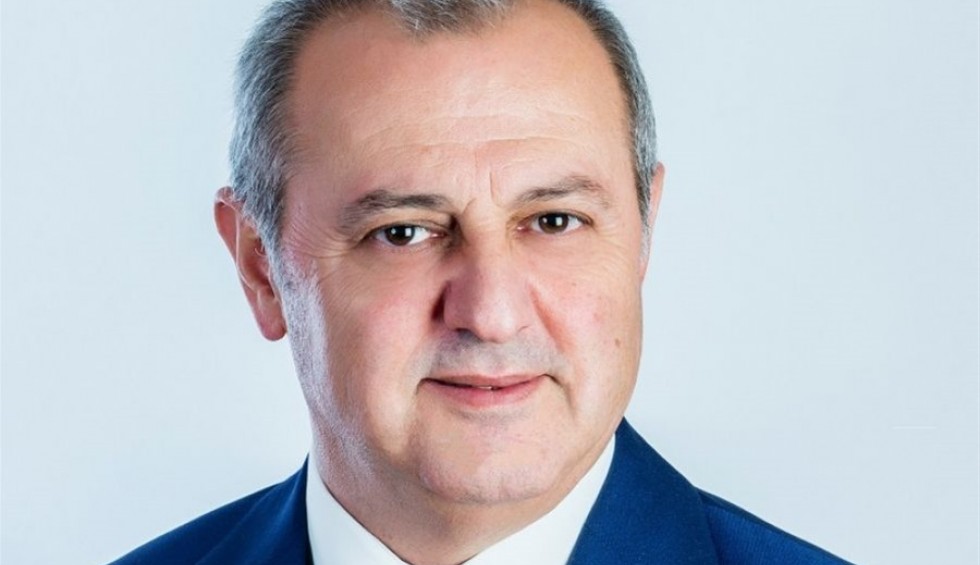 A generic square placeholder image with rounded corners in a figure.