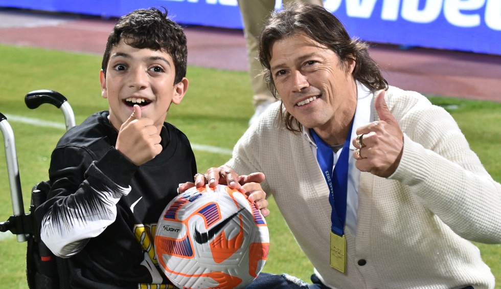 A generic square placeholder image with rounded corners in a figure.