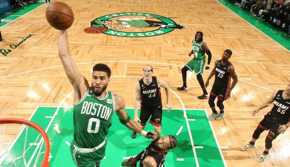 A generic square placeholder image with rounded corners in a figure.