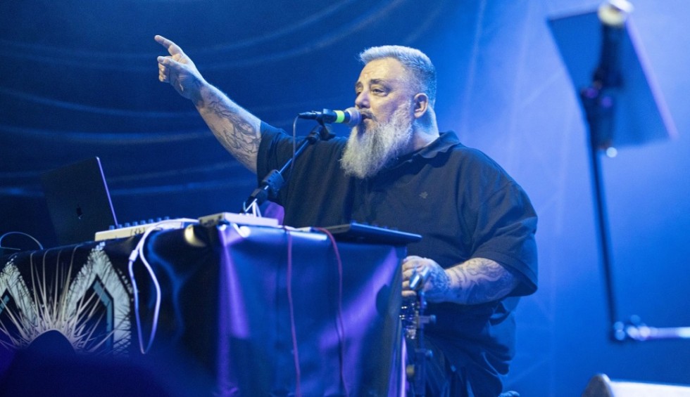 A generic square placeholder image with rounded corners in a figure.