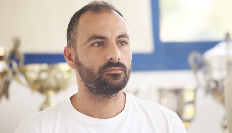 A generic square placeholder image with rounded corners in a figure.