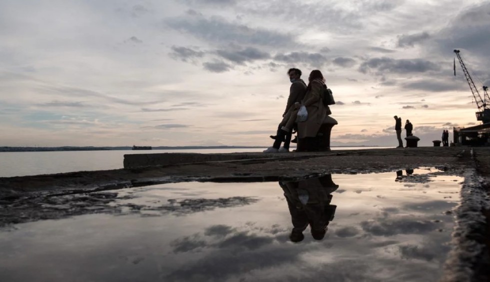 A generic square placeholder image with rounded corners in a figure.