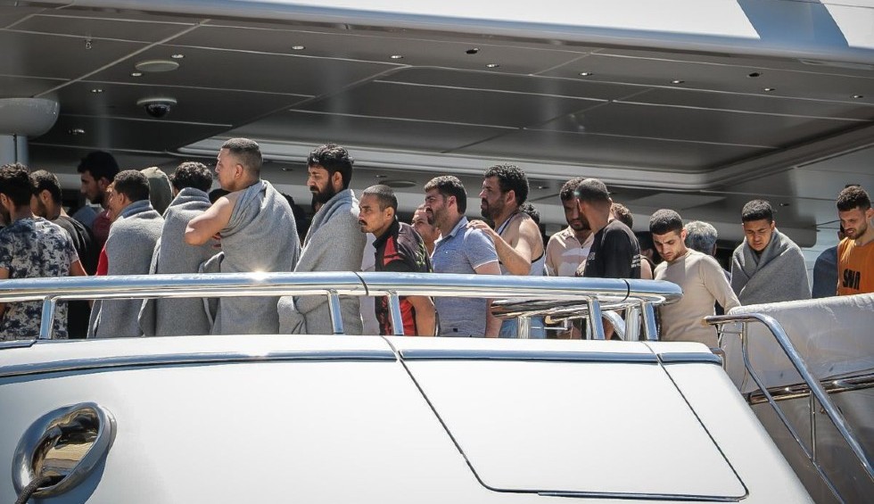 A generic square placeholder image with rounded corners in a figure.