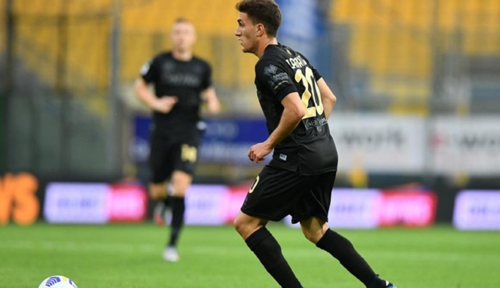 A generic square placeholder image with rounded corners in a figure.