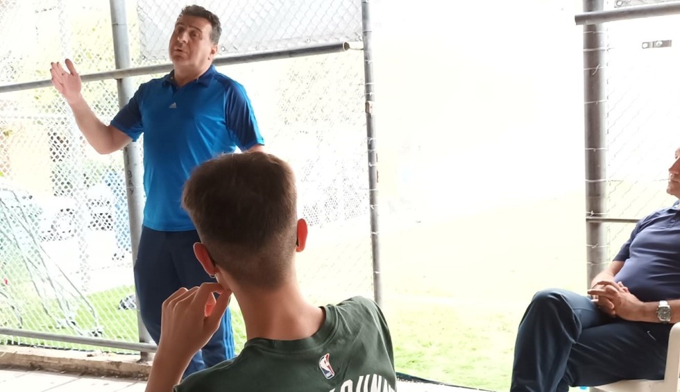 A generic square placeholder image with rounded corners in a figure.