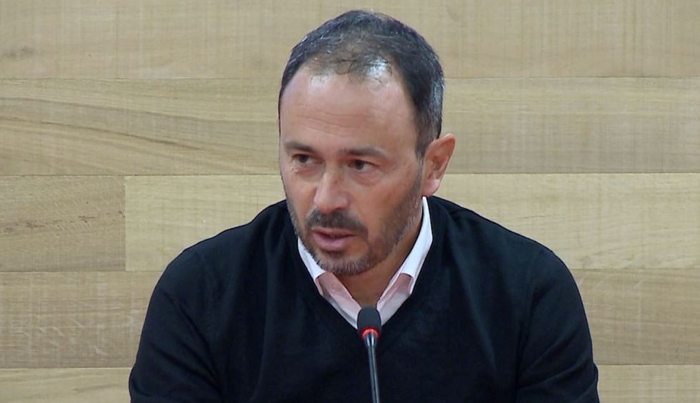 A generic square placeholder image with rounded corners in a figure.