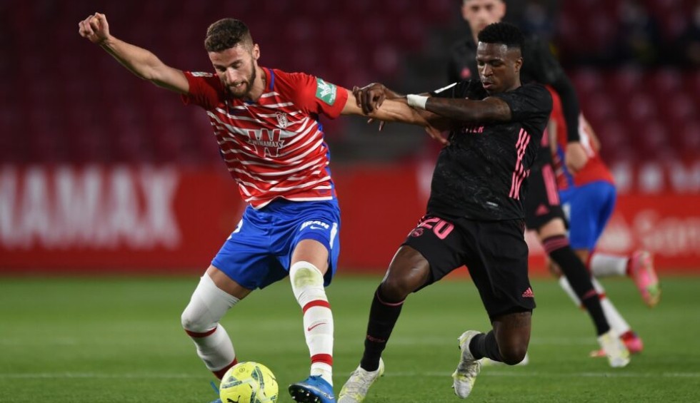 A generic square placeholder image with rounded corners in a figure.