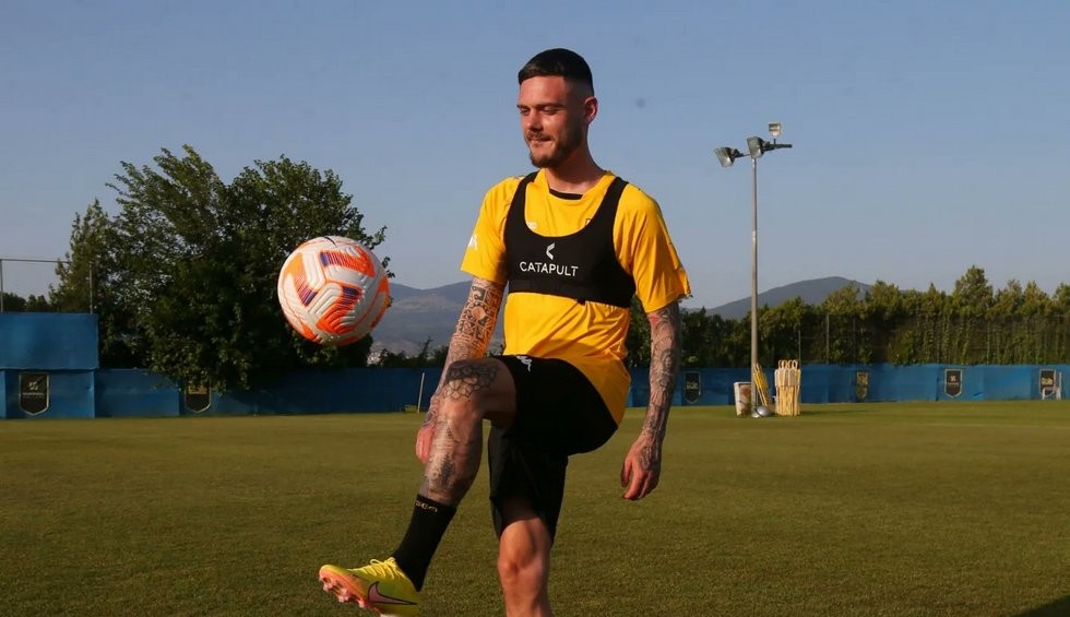 A generic square placeholder image with rounded corners in a figure.