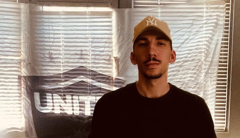 A generic square placeholder image with rounded corners in a figure.