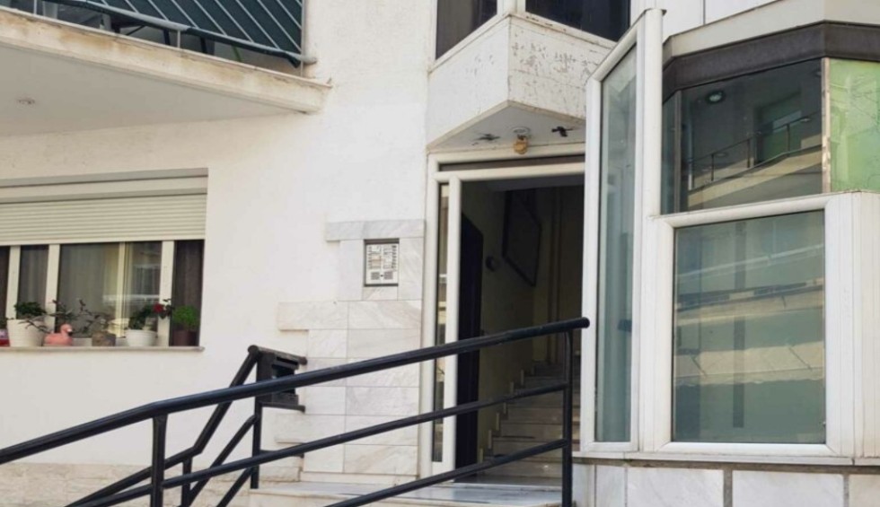 A generic square placeholder image with rounded corners in a figure.