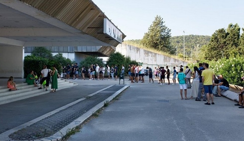 A generic square placeholder image with rounded corners in a figure.