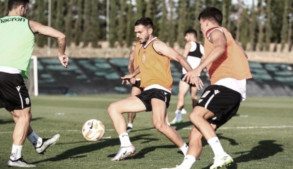 A generic square placeholder image with rounded corners in a figure.