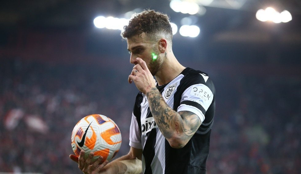 A generic square placeholder image with rounded corners in a figure.