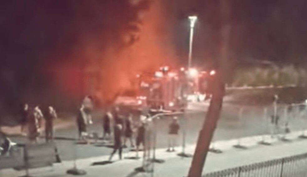 A generic square placeholder image with rounded corners in a figure.