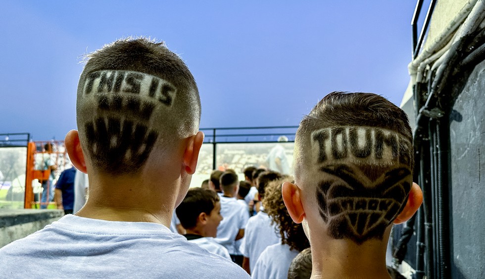 A generic square placeholder image with rounded corners in a figure.