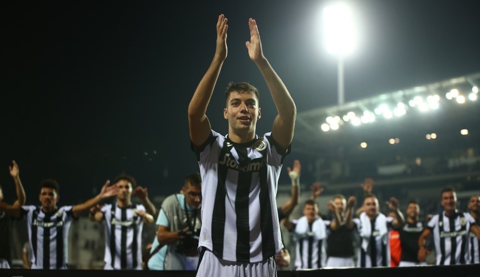 A generic square placeholder image with rounded corners in a figure.